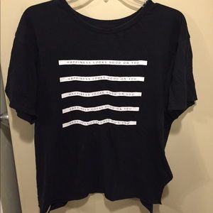 black “happiness looks good on you” t shirt